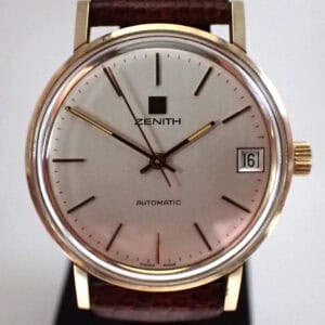 Zenith automatic wristwatch with date display and brown leather strap.