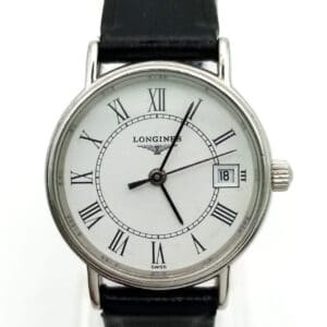 The Longines Ladies Quartz Watch features a white dial, black Roman numerals, date window at 3 o’clock, and a black leather strap. The time displayed is 2:23:52.