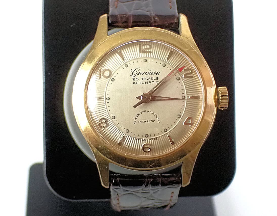 Vintage gold Genève automatic wristwatch with leather strap, rare 25 jewels movement.