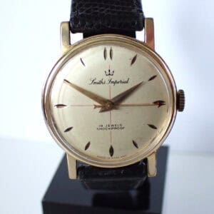 Vintage Smiths Imperial men's wristwatch with shockproof movement and leather strap.