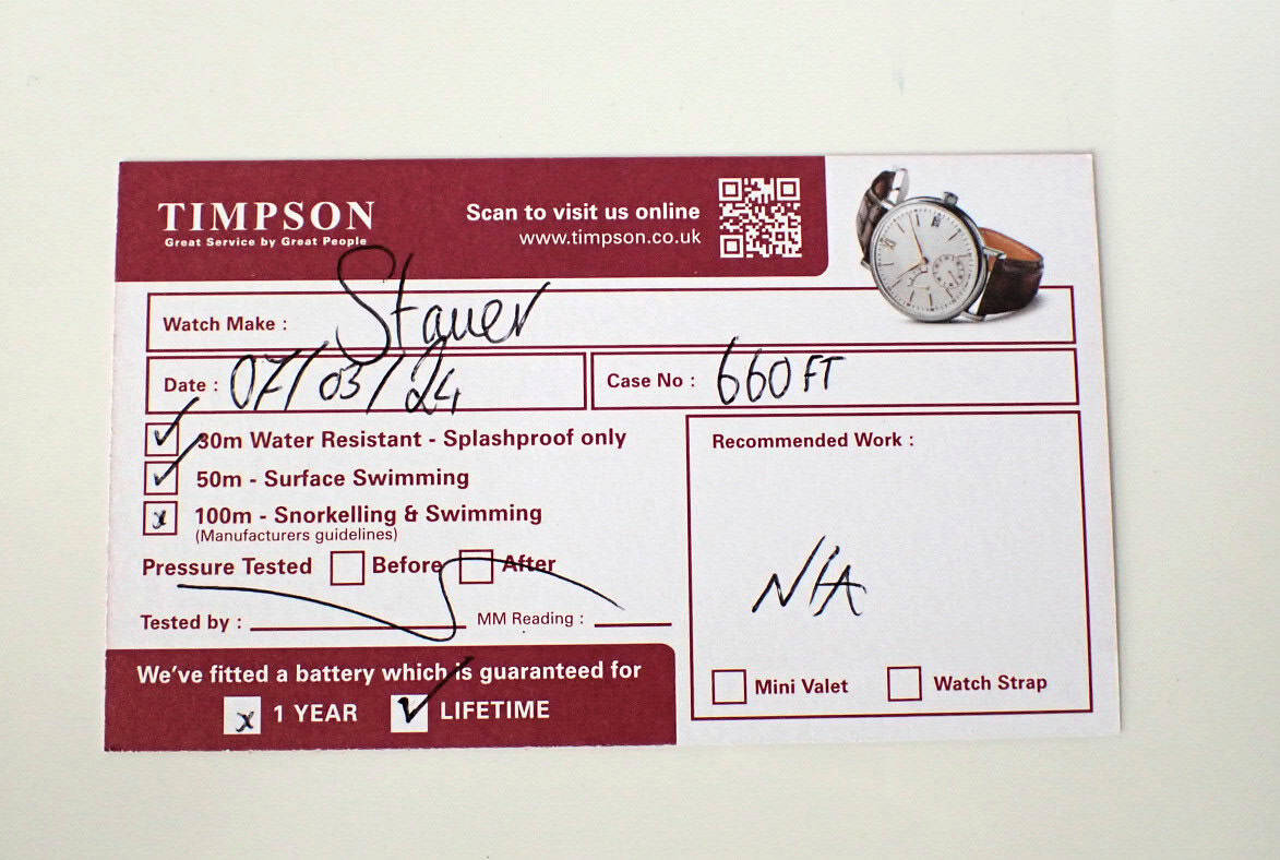 Stampler watch service tag with watch image, 30m water resistance, swimming & snorkeling verification.