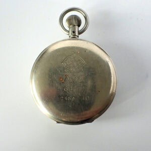 Antique silver pocket watch case with engraved markings and logo.