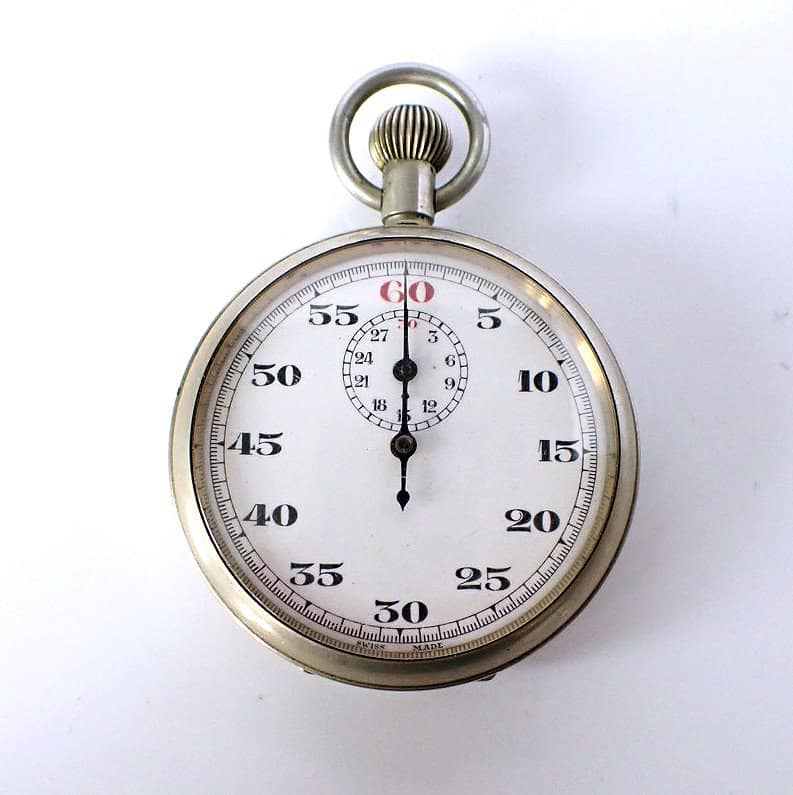Silver stopwatch with white dial and black numerals, precision timing instrument for sports and events.