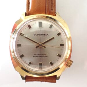 The SUPEROMA Mechanical Gold Plated Watch features a gold face, brown leather strap, silver dial, black hour markers, and "ANTIMAGNETIC WATER-RESISTANT" on the face. Pay interest-free in three with Klarna.
