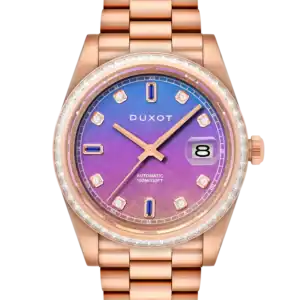 The Duxot SERENATA AUTOMATIC LIMITED EDITION Rose Gold Coloured Meteorite DX-2058-BB features a rose gold link bracelet, gradient purple-blue dial with diamond markers, date at 3 o’clock, and a silver bezel.