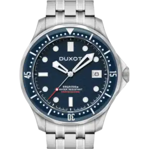 The Duxot HENRI DIVER AUTOMATIC Presidential Blue DX-2060-22 wristwatch features a silver case, blue textured dial, white hour markers, a date window at 3 o’clock, metal link bracelet, and a marked rotating bezel.