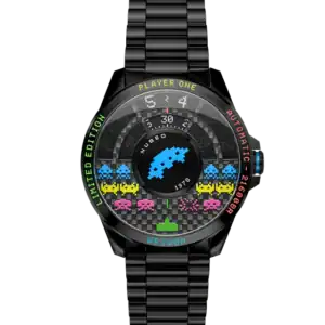 The NUBEO QUASAR AUTOMATIC SPACE INVADERS LIMITED EDITION Dark Matter NB-6082-SI-44 is a black wristwatch with a metallic strap, showcasing a colourful Space Invaders dial and phrases like PLAYER ONE, LIMITED EDITION, and AUTOMATIC on the face.