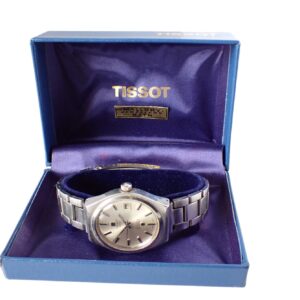 A Tissot SEASTAR Automatic (c1975) with its original metal strap is displayed in an open blue Tissot box lined with purple satin, featuring the Tissot logo inside the lid. Pay interest-free in three with Klarna.