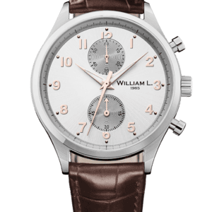 A William L 1985 Vintage Style Small Chronograph in bicolour stainless steel with a silver dial, two sub-dials, and a brown ‘croco’ leather strap. Ref. WLAC02GOCM. Buy at 0% with Klarna.
