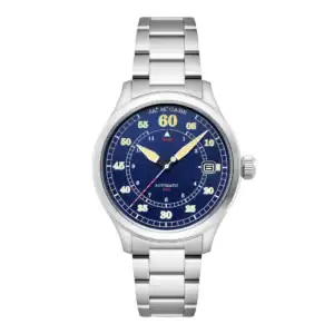 The James McCabe BOBBER AUTOMATIC Cobalt Blue features a stainless steel case, blue dial with white and gold hour markers, red accents, silver metal bracelet, and "AUTOMATIC" above 6 o'clock. Brand name appears at the top of the face.