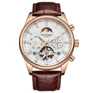 The Swan and Edgar Complexity Automatic is a luxury wristwatch featuring a white dial, gold case, brown leather strap, exposed gears, day and date displays, and a blue and gold moon phase indicator at the top.
