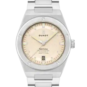 The Duxot Bastia Automatic Warm Grey DX-2068-11 features a silver case and metal band, beige textured dial, silver markers and hands, date at 6 o’clock, and “Dynasty Automatic” on the face. Also available in Sandy Silver and Iconic Black.