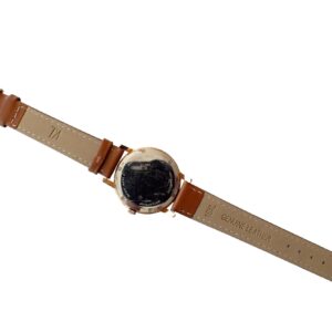 Stainless steel and leather wristwatch with genuine leather strap and classic design.