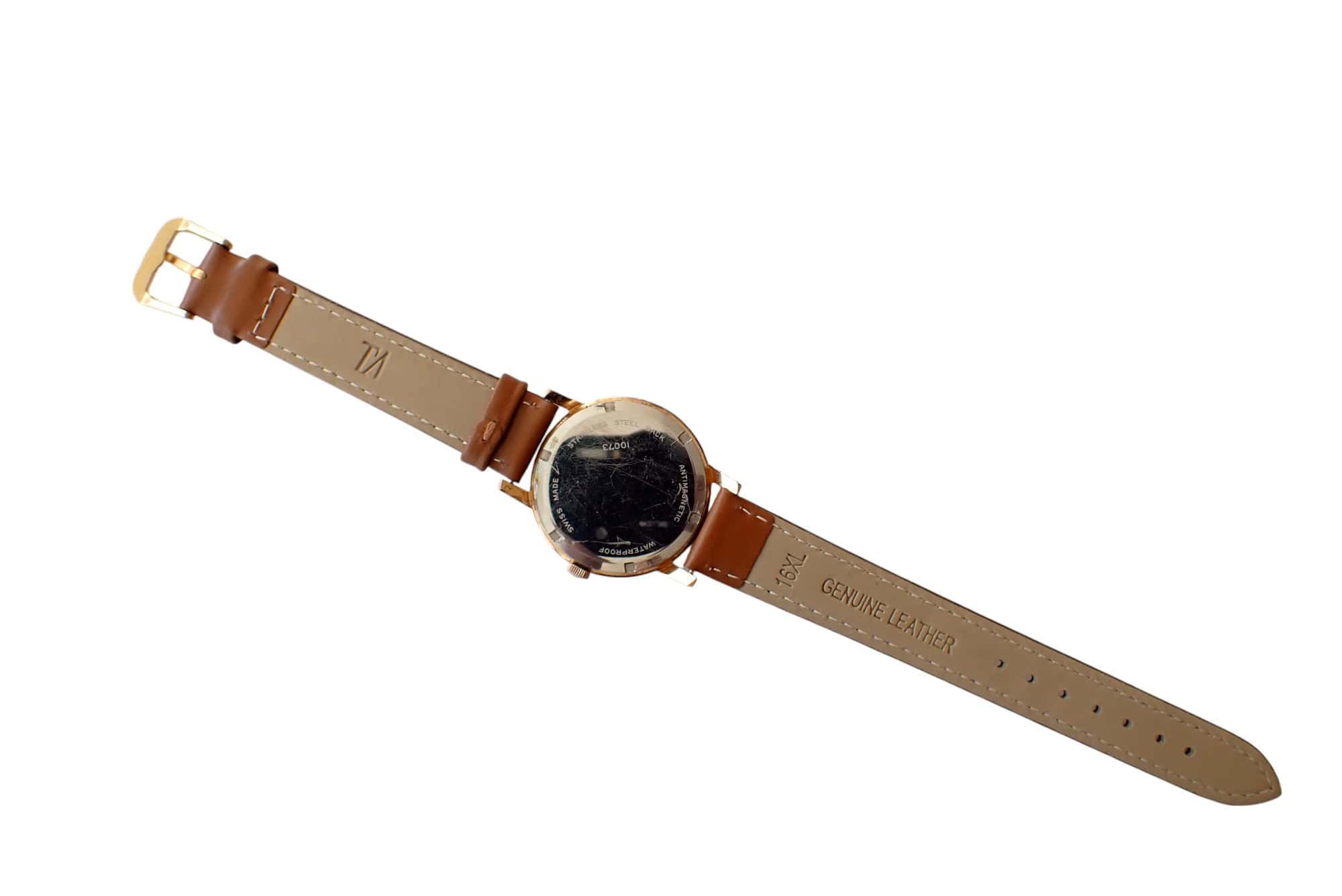 Stainless steel and leather wristwatch with genuine leather strap and classic design.