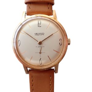 Antique Geneva Sport wristwatch with leather strap and minimalist dial.