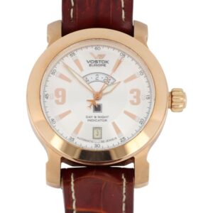 Vostok Europe men's luxury wristwatch with gold-tone case and brown leather strap.