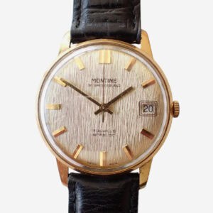 Gold vintage Montine wristwatch with black leather strap, date display, Swiss made.