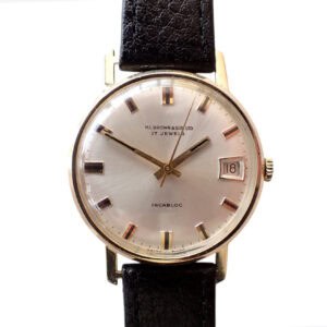 Elegant vintage H.L. BROWN & SONS Ltd men's wristwatch with leather strap and date display.
