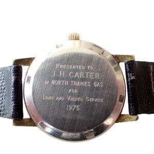 Vintage wristwatch with engraved case back commemorating service by North Thames Gas, 1975.
