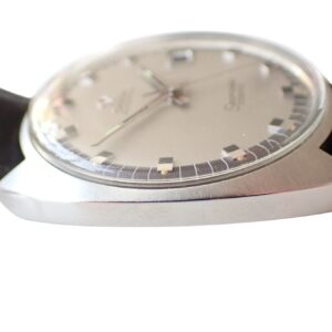 Vintage luxury Swiss watch with silver dial and black leather strap for collectors.