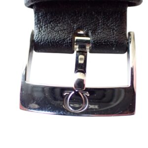 Shuttle buckle with leather strap for watches, silver metal finish, luxury accessory.