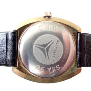 Vintage watch back engraving showing 25-year service commemorative message and logo.