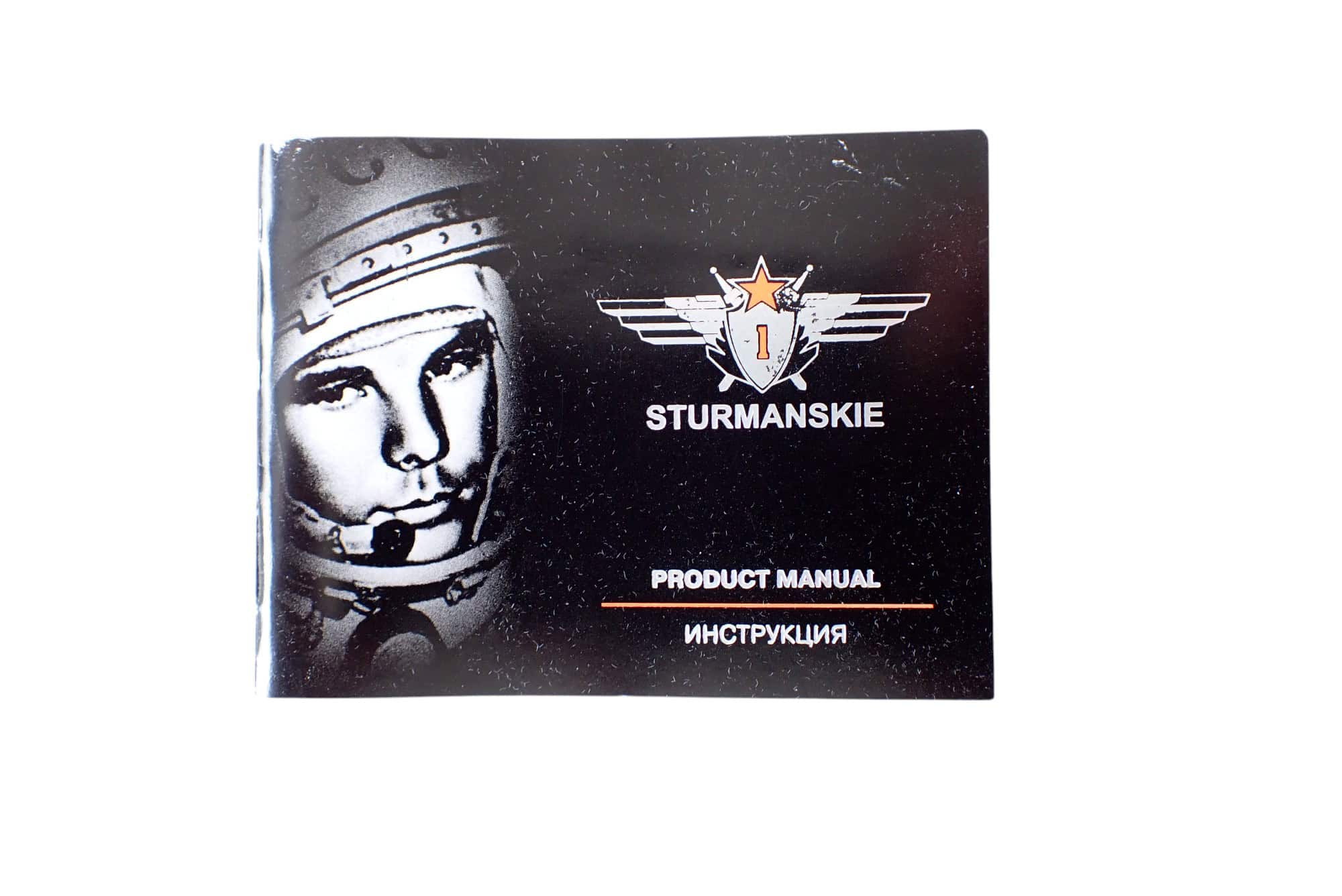 Aerospace engineer product manual with pilot illustration and winged emblem.