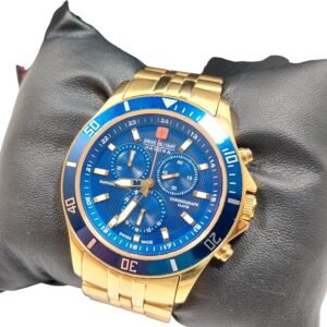 The Swiss Military Hanowa Flagship Chrono Sapphire 06-4183.7/6-51837 gold wristwatch, featuring a blue dial, chronograph functions, and white hour markers and bezel numbers, is displayed on a black cushioned pillow.