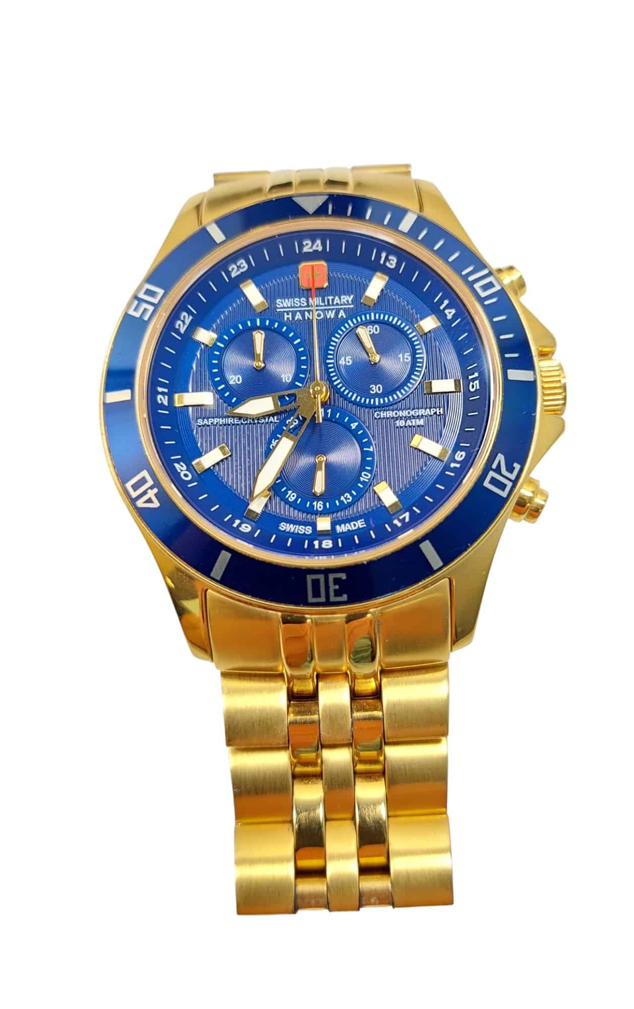 The Swiss Military Hanowa Flagship Chrono Sapphire 06-4183.7/6-51837 is a gold wristwatch with a blue bezel and dial, three subdials, a Swiss Military Hanowa logo, and a polished linked metallic strap.